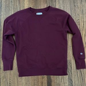 Maroon colored champion crewneck